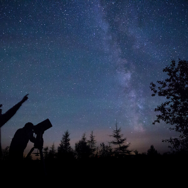 Picture of GVSU student and faculty member stargazing