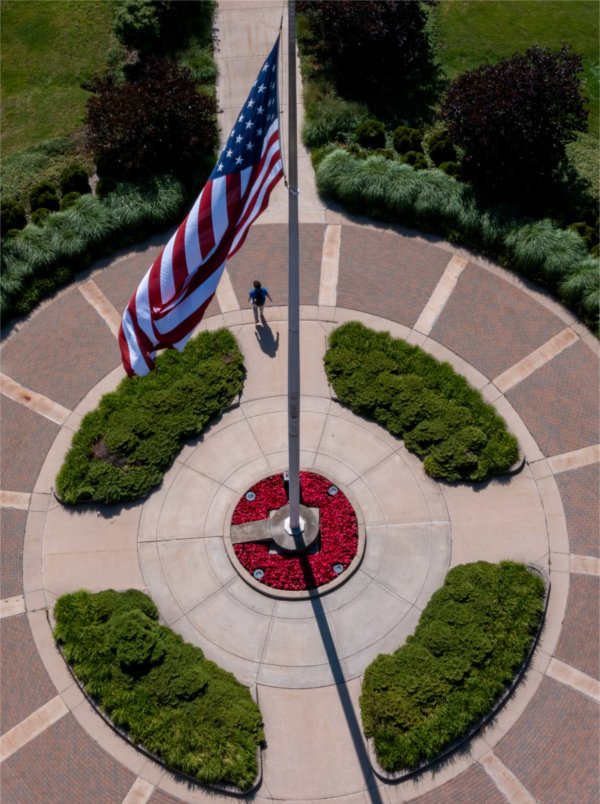 The American flag is seen from above on the Grand Valley campus.