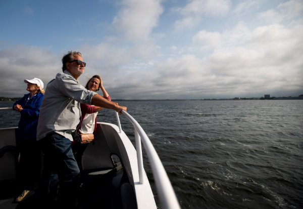 U.S Senator Gary Peters looks over Muskegon Lake