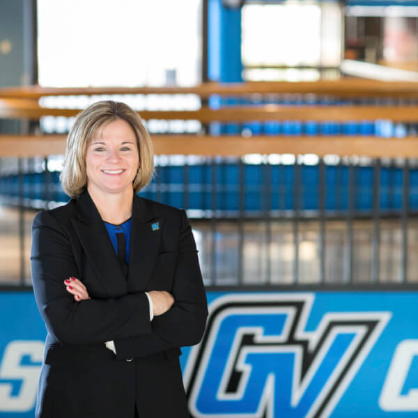 Keri Becker, standing in Fieldhouse Arena
