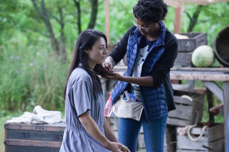 Photo of students working on the set of the Summer Film Project.