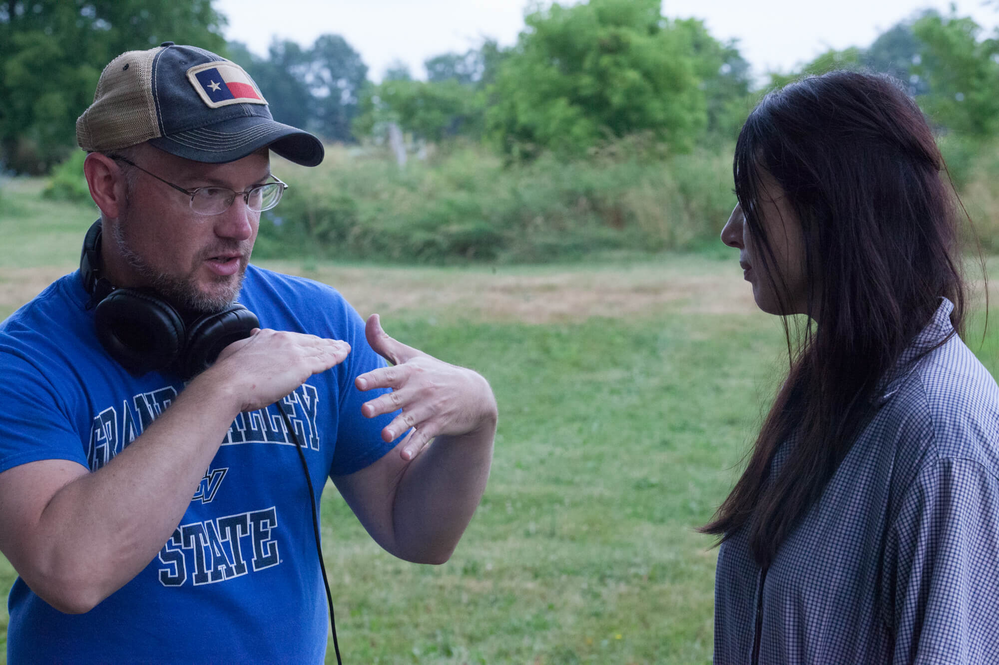 Director Aaron Shuelke working with an actress on the set of the Summer Film.
