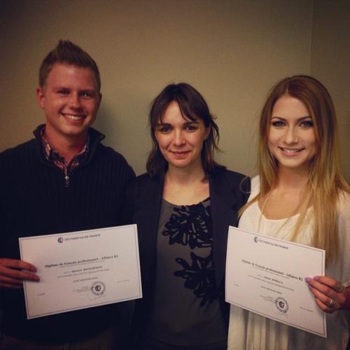 Professor Séverine Ward and students Spencer Richardson and Aimee Ridella with their diplomas. 