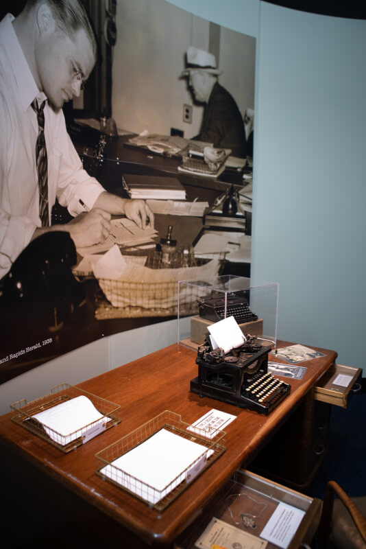 A portion of the exhibit featuring a typewriter is shown.