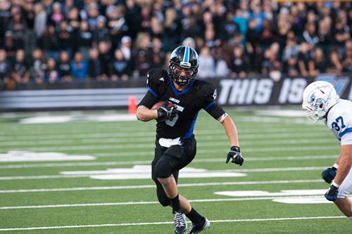 Kids under 12 are admitted free to Saturday's football game, with purchase of an adult ticket.