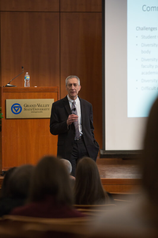 Man stands in front of stage