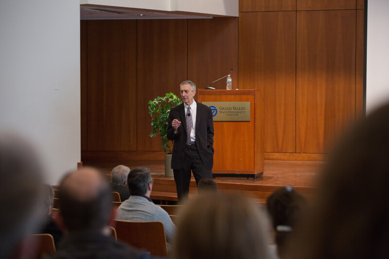 Man stands in front of stage