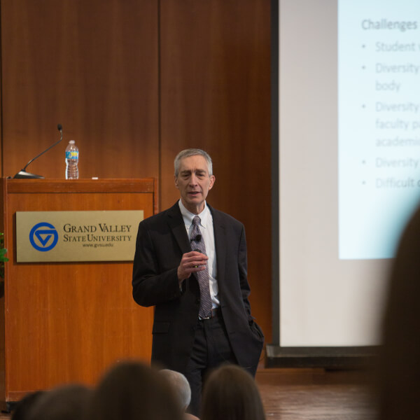 Man stands in front of stage