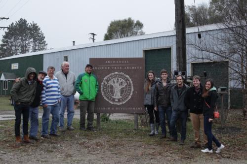 School of Communications students Atikh Bana, Chad Rodgers, Lindsey VanDenBoom, Joseph Buckenmeyer, Ian Kast, Olga Sarayeva and Richard Iseppi pose with members of Archangel Ancient Tree Archive. Photo courtesy: GVSU Ford Team - See 