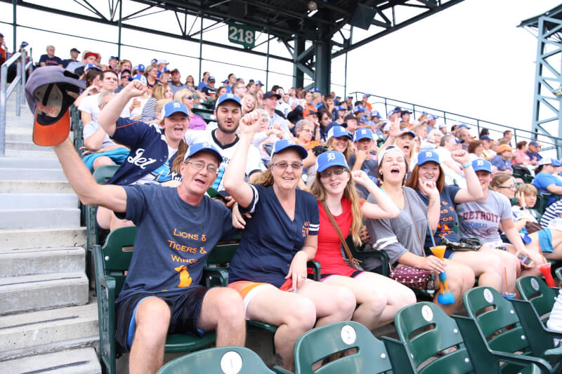  Group of fans celebrating at the baseball game