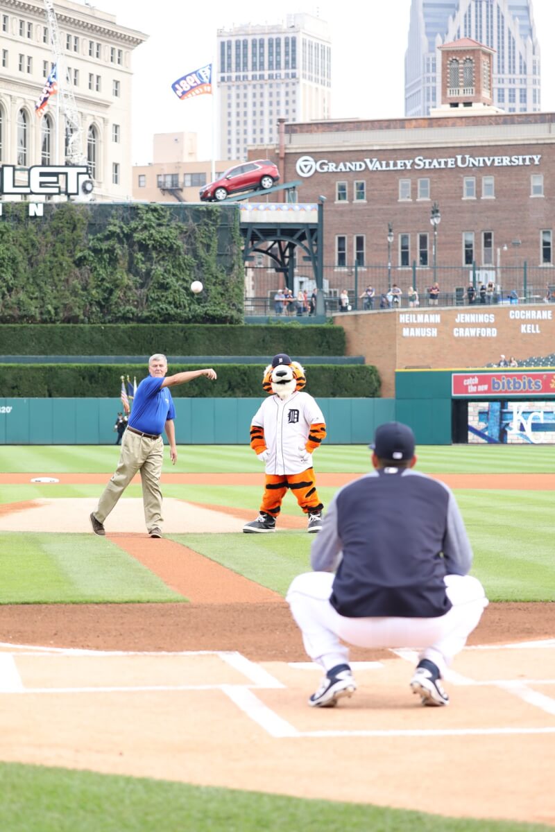  President Thomas J. Haas throws the first pitch. 