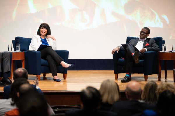 President Philomena V. Mantella and Quentin Messer Jr. discuss a topic with an audience member.
