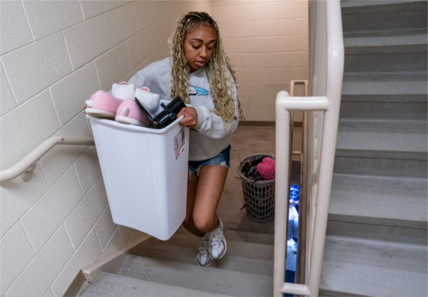 Criminal justice major Courtney Jacobs moves into Secchia Hall.