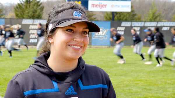 Softball player Janalee Lyke smiles for a photo