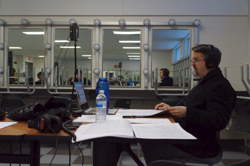 Kevin Tutt monitors a recording session behind-the-scenes. Photo by Nate Bliton.