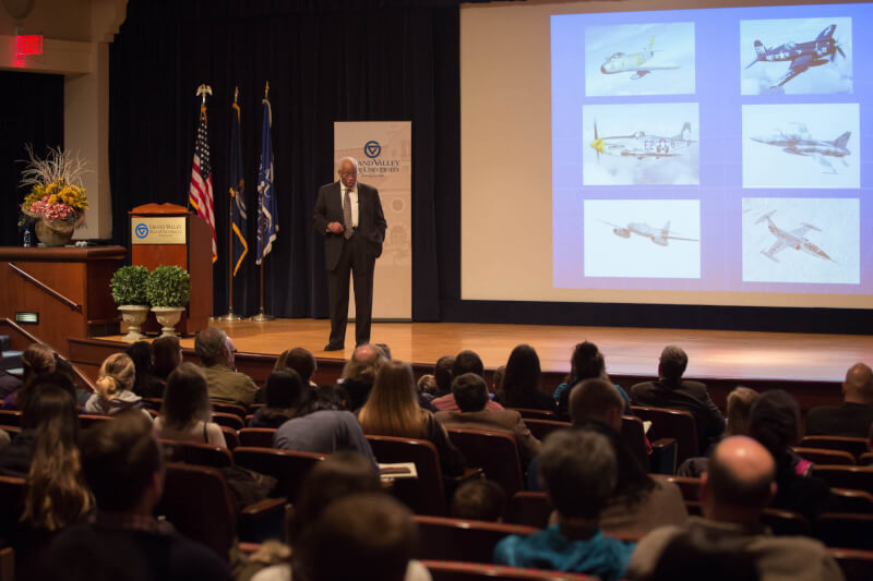 A photo of Guion Bluford giving a presentation.