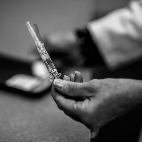 Needle with vaccine.