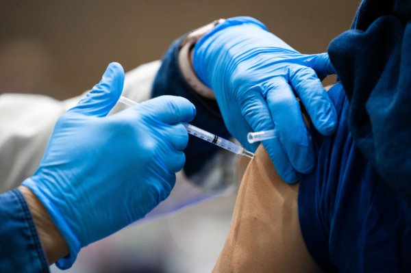 A person getting a COVID-19 vaccine.