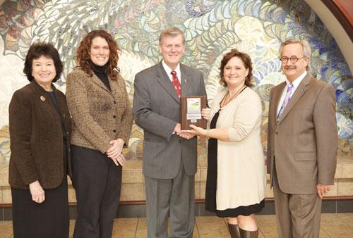 Pictured from left are Gayle R. Davis, Norine Mulvihill, Thomas J. Haas, Kelly Lemon-Samborski and D. Scott Richardson.