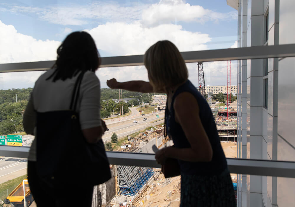 President Mantella looks at construction on the Daniel and Pamella DeVos Center for Interprofessional Health being built on the Medical Mile.