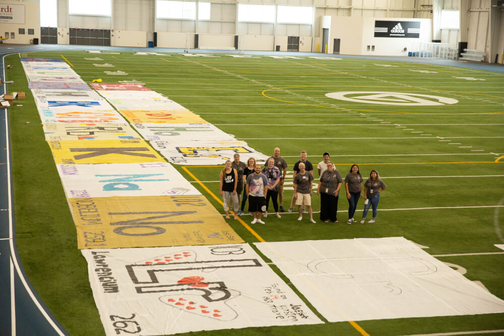 Volunteers on July 18 at the end of their trial run for an attempt at creating the world's largest periodic table.