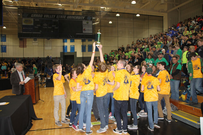 Students from Grand Haven Public Schools celebrating a victory at the Science Olympiad.