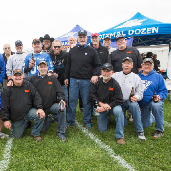 Members of the Dizmal Dozen tailgate before the October 15, 2016 homecoming game.