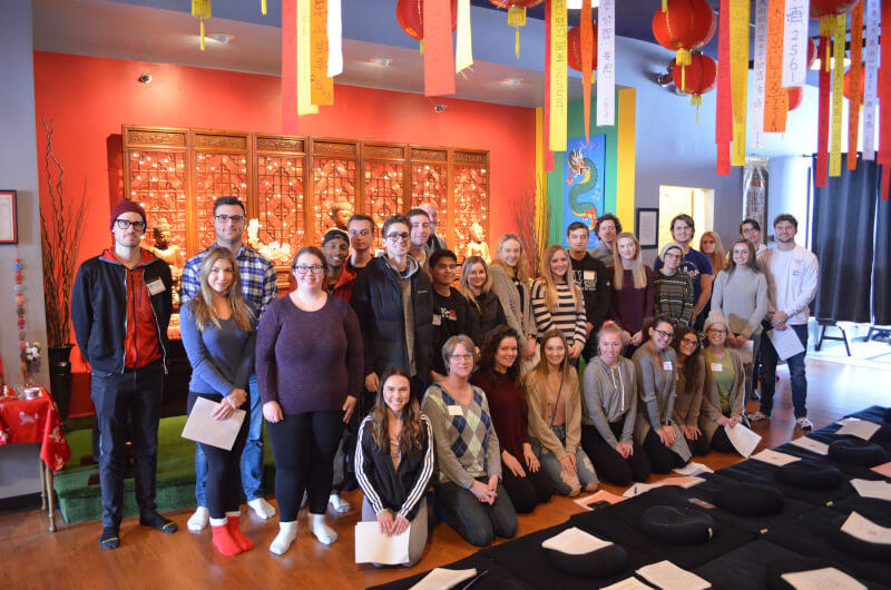 group of people in Buddhist temple