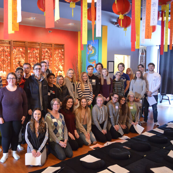 group of people in Buddhist temple