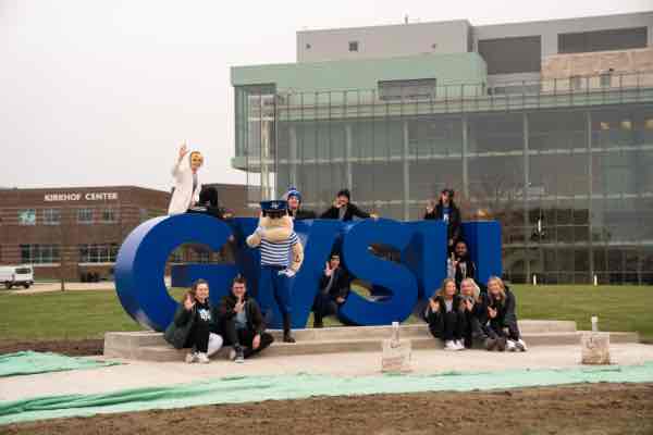 Students atop the new Laker Letters in Allendale.