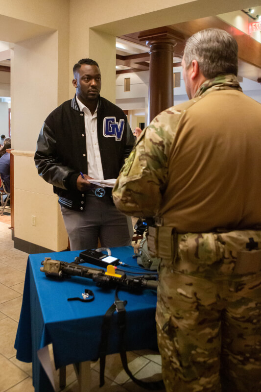 Students shown interacting with FBI agents during the 2019 FBI Collegiate Academy January 25.