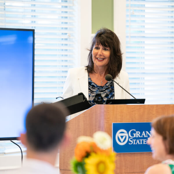 President Mantella speaks at a welcome event for Brooks College.