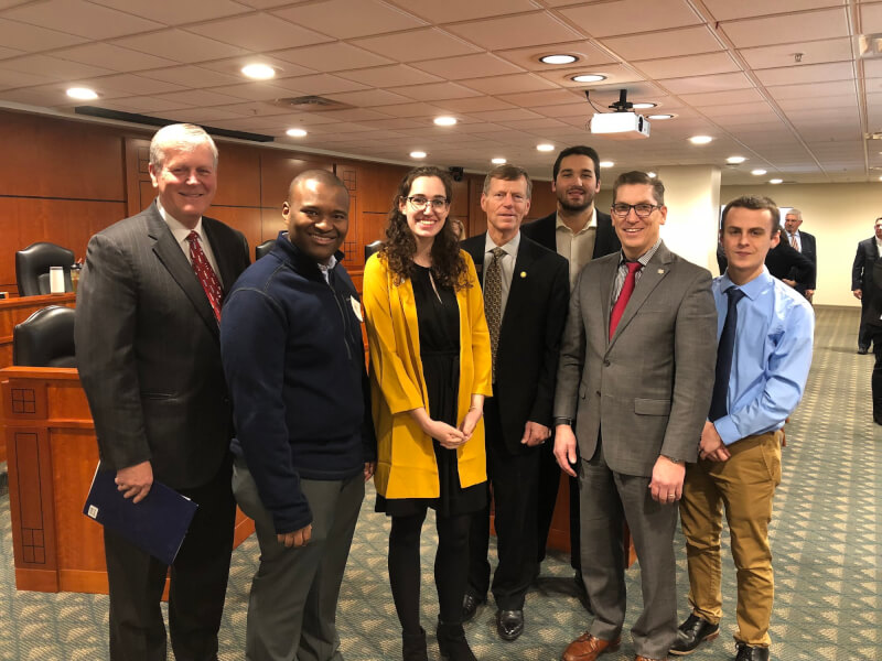 President Thomas J. Haas, far left, and Student Senate President Rachel Jenkin, third from left, testified before the Michigan House Subcommittee on Higher Education February 14.