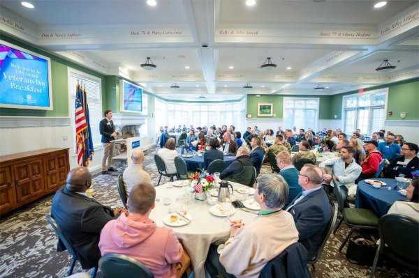 Nick Adams, a fellow at the Peter C. Cook Leadership Academy and a former Marine, speaks during the 13th Annual Veterans Breakfast.