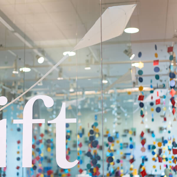 colorful shapes of paper with short phrases