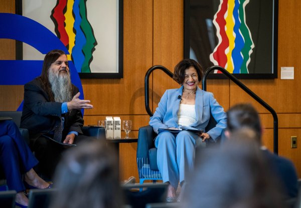 Provost Fatma Mili and Bryan Alexander, senior scholar at Georgetown University, listen to a question from an audience member during the inaugural President's Forum.