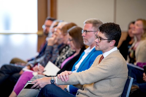 Audience members listen to Bryan Alexander, senior scholar at Georgetown University, during the inaugural President's Forum on October 16.