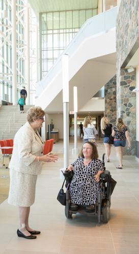 Lee Van Orsdel, dean of University Libraries, talks to Board of Trustee member Kate Pew Wolters in the Mary Idema Pew Library Learning and Information Commons.