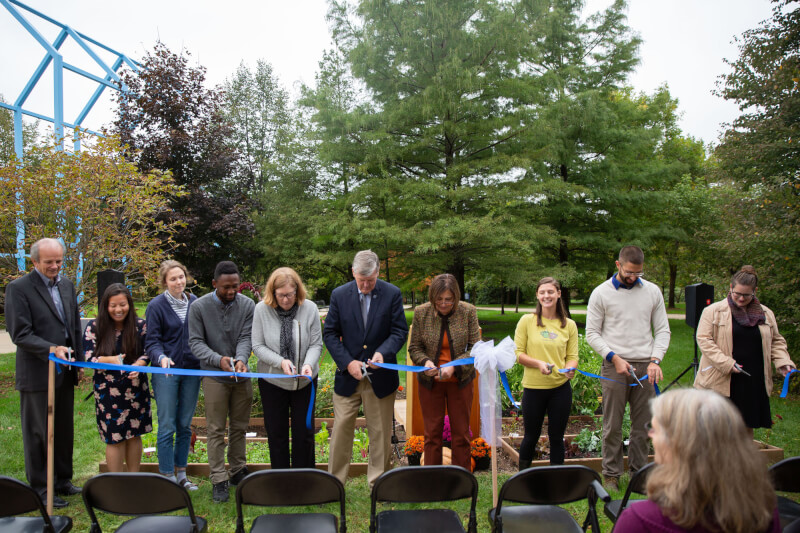 A photo of President Haas, Dean Hiskes and other at the ribbon cutting ceremony.