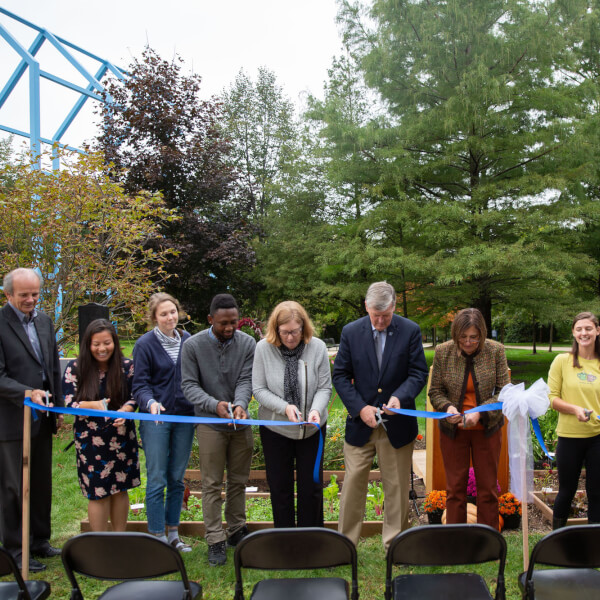 A photo of President Haas, Dean Hiskes and other at the ribbon cutting ceremony.