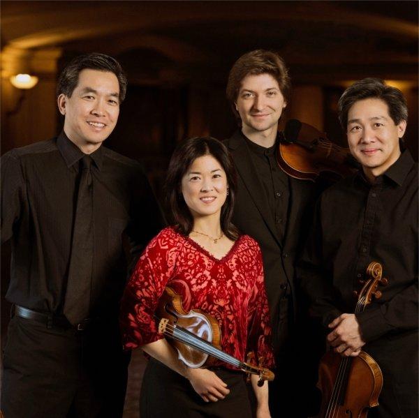 Ying Quartet, l-r: David Ying (cello), Janet Ying (violin), new first violinist Robin Scott, and Phillip Ying (viola) outside Kodak Hall at Eastman Theatre, Eastman School of Music.