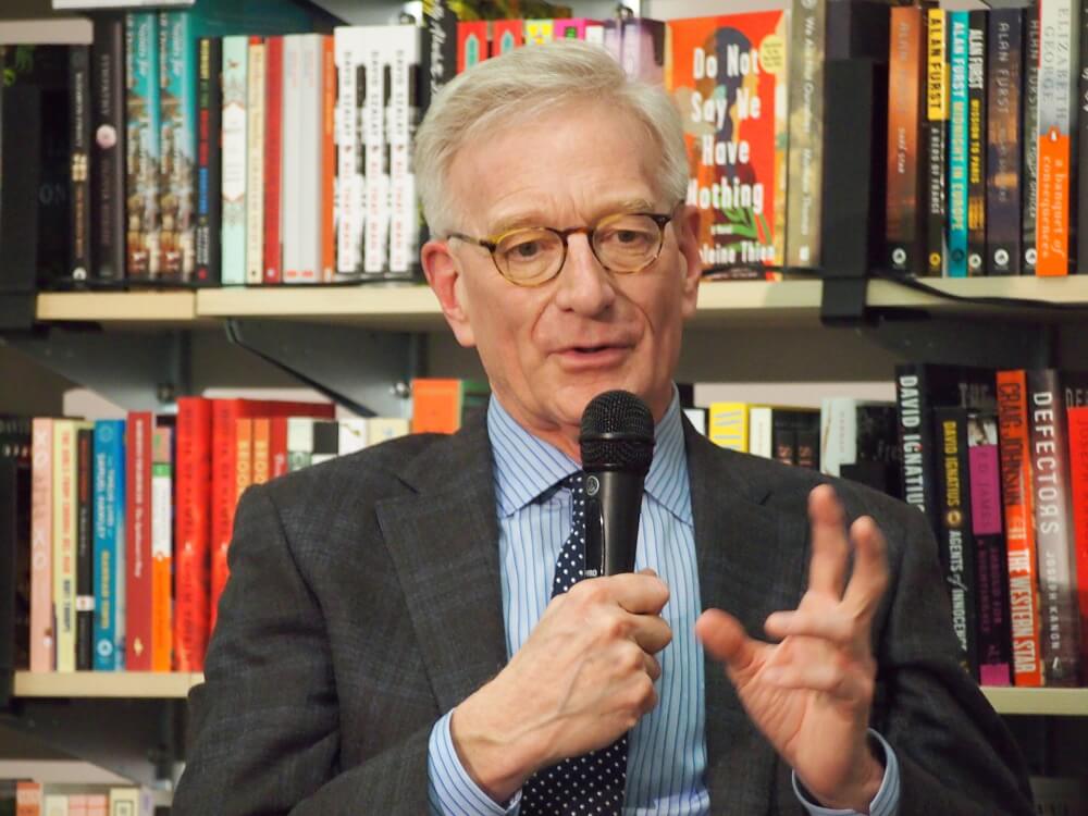 Hank Meijer speaks into a microphone.