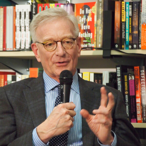 Hank Meijer speaks into a microphone.