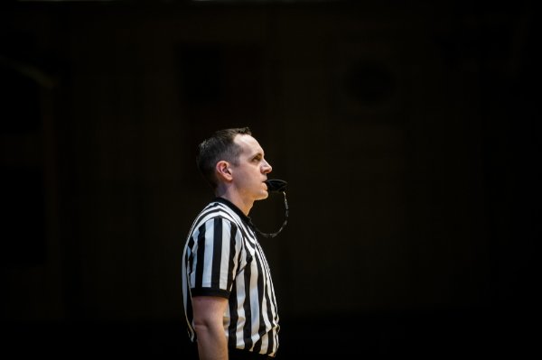Cris Haro uses a whistle cover when officiating basketball games.