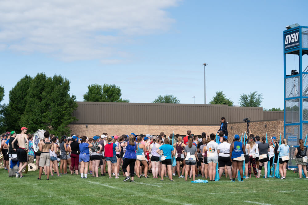 GVSU President Philomena Mantella addresses the Laker Marching Band during move-in week.