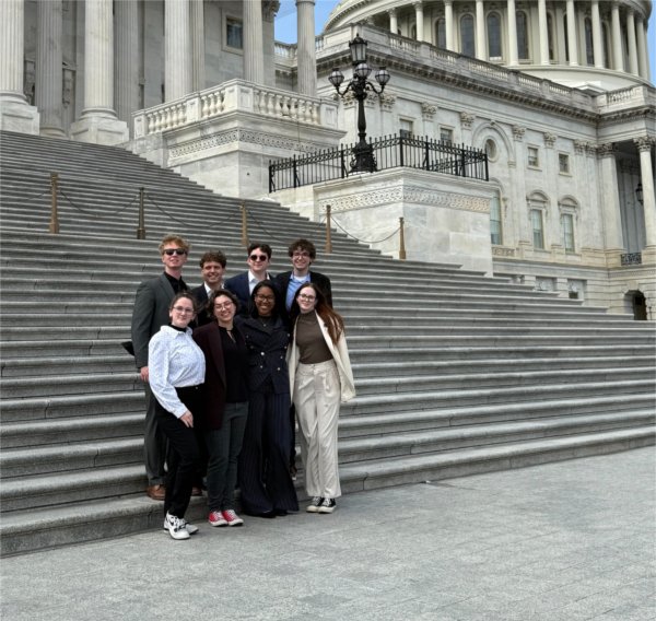eight students in front of US capitol building