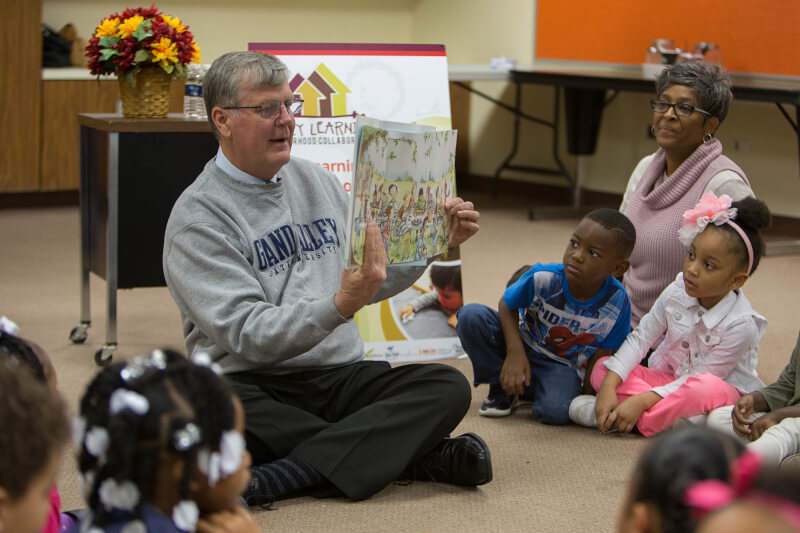 President Haas read The Sandwich Swap to preschool students at Explore and Learn Academy in Grand Rapids.