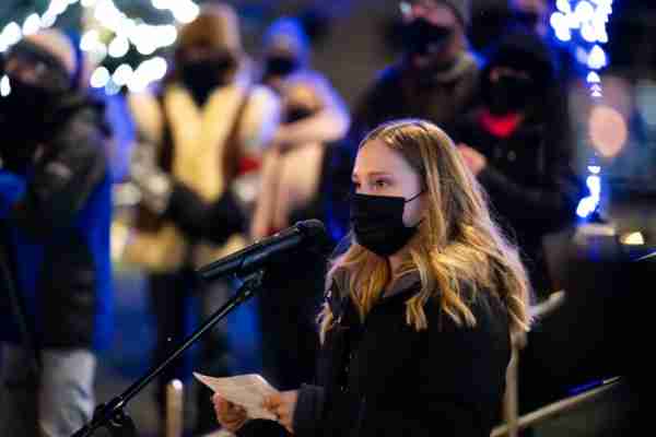 Mikaela Brzuchowski, a GVSU junior, speaks during a candlelight vigil held December 16 in memory of Taylor DeRosa. 