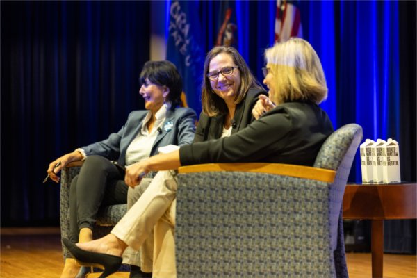 President Philomena V. Mantella, left, CEO of the Knight Commission on Intercollegiate Athletics, Amy Privette Perko, center, and Director of Athletics Keri Becker share a laugh during the President's Forum on October 16.