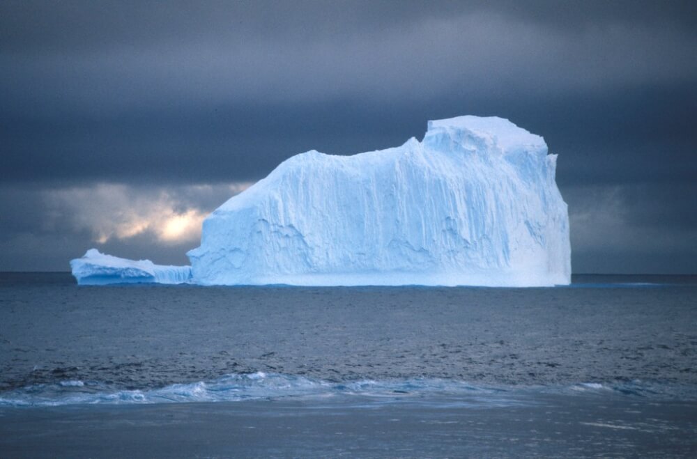 An iceberg in the ocean.